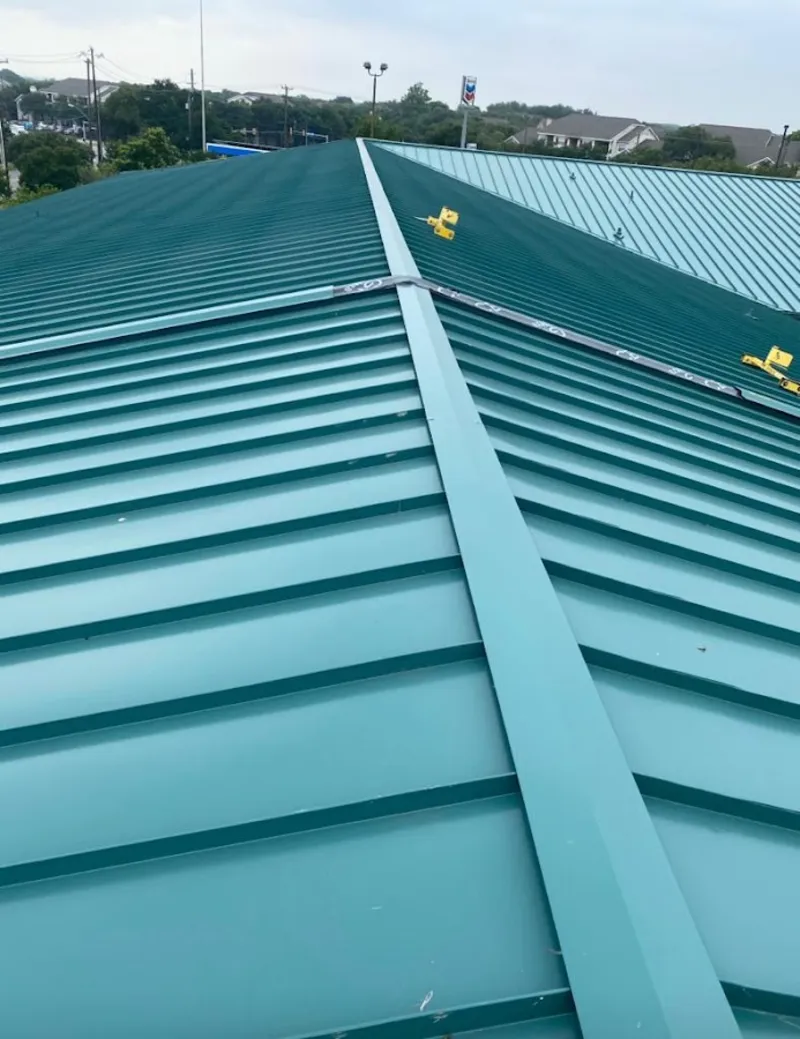 Green commercial metal roof ridge and valley for Metal Roof Repair in Foothill Farms